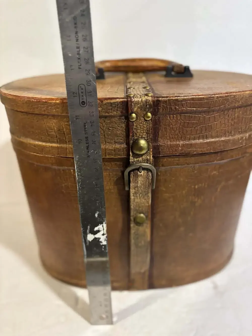 Vintage Oval Leather Hat Box with Brass Buckle and Burgundy Lining
